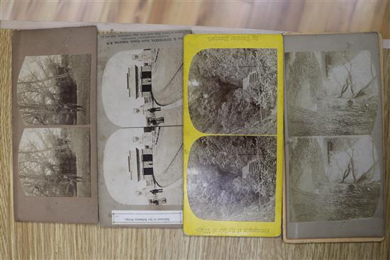 A collection of stereoscopic cards including Boer War and two viewers